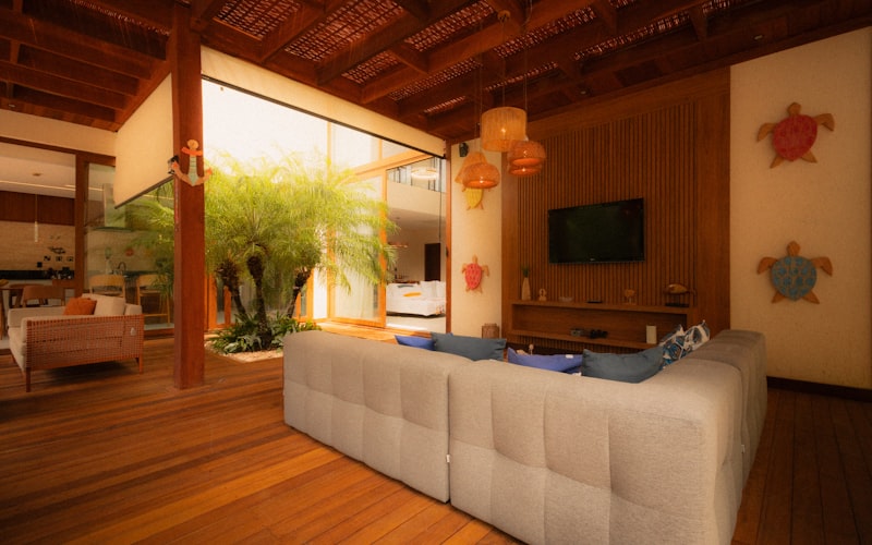 Bright, comfortable living room with natural light and plants